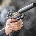 Handgun with Banish 9